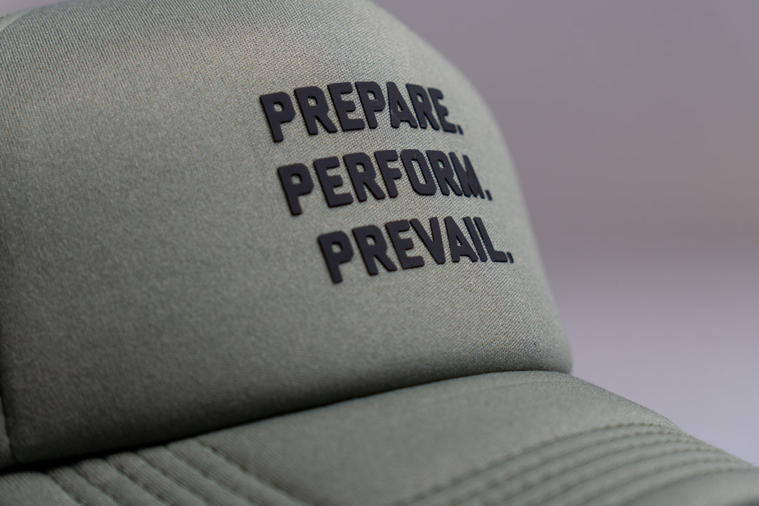 Combvt™ Motto Military Green Trucker Hat