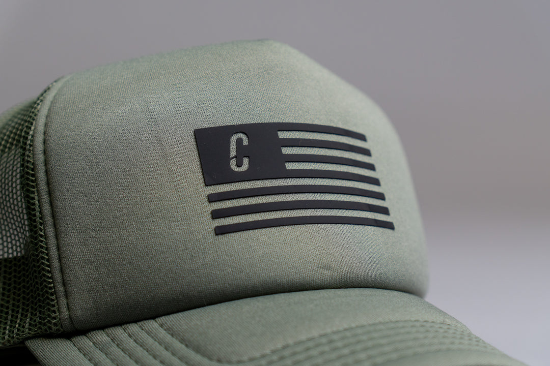 Combvt™ Motto Military Green Trucker Hat